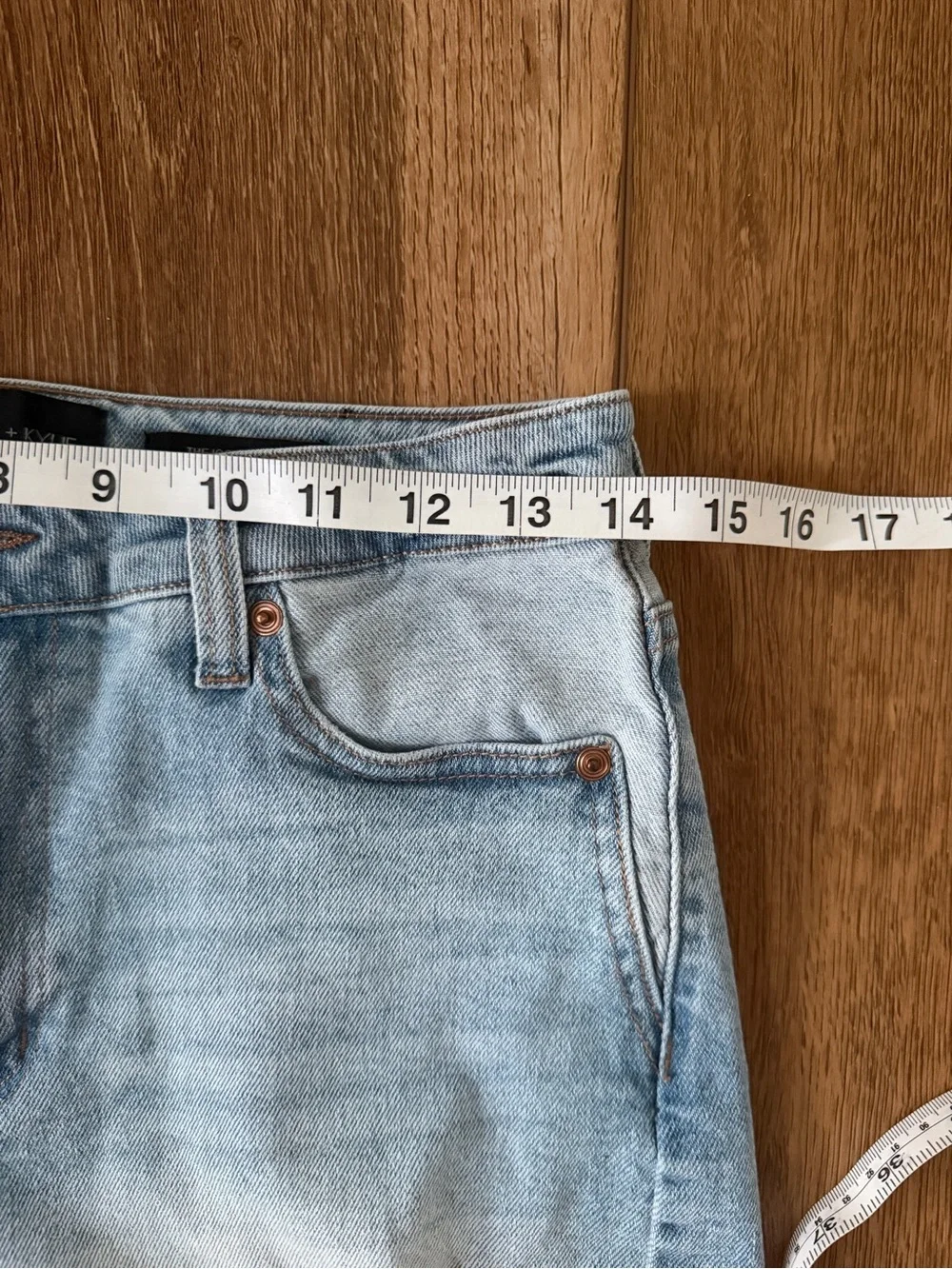 light wash distressed denim shorts